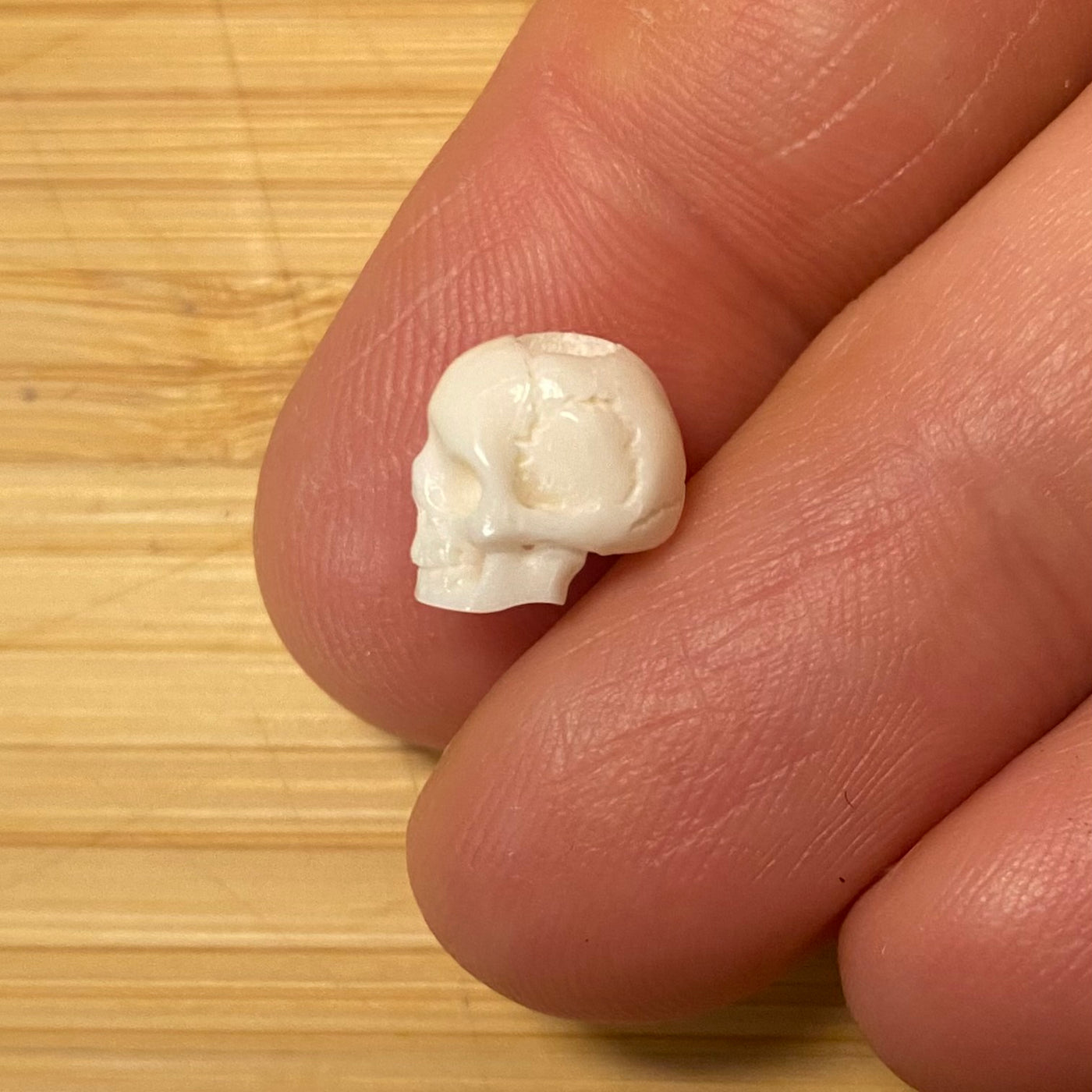 Hand carved bone skull beads