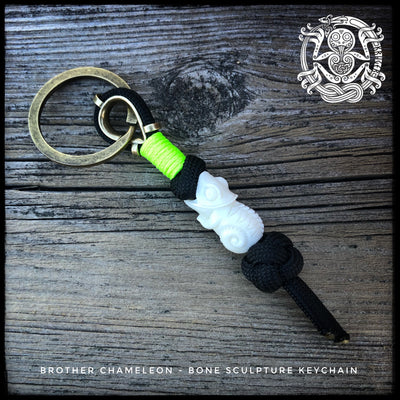 Mini keychain with carved wooden or bone skull