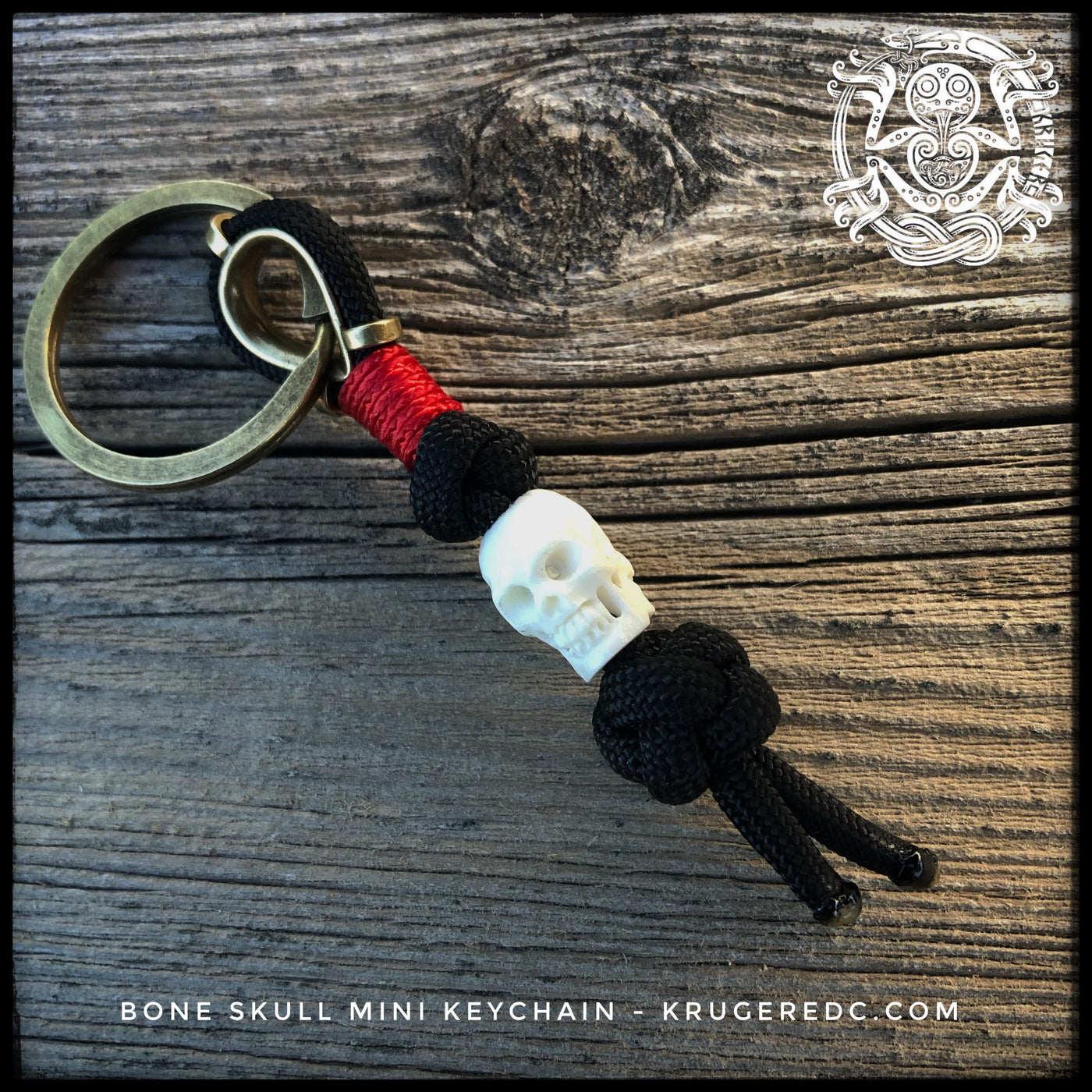 Mini keychain with carved wooden or bone skull