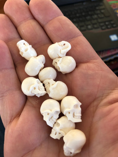Hand carved bone skull beads